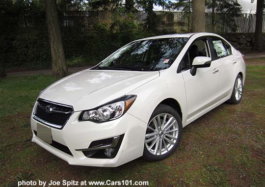 2015 Subaru Impreza Limited 4 door sedan, crystal white shown