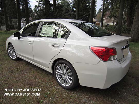 rear view 2015 Subaru Impreza Limited 4 door sedan, crystal white shown