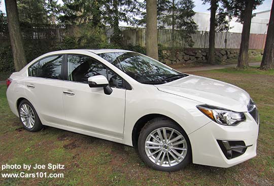 side view 2015 Subaru Impreza Limited 4 door sedan, crystal white shown