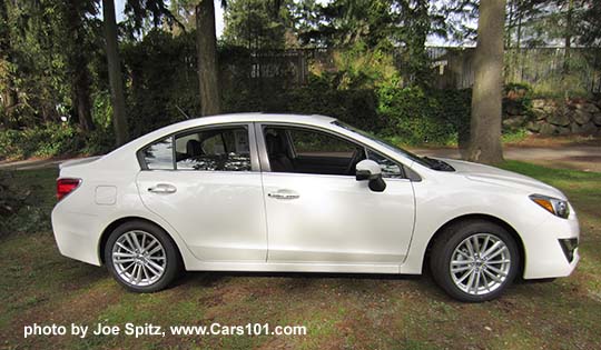 2015 Subaru Impreza Limited 4 door sedan, crystal white shown