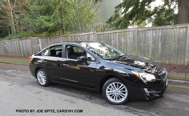 2015 Subaru Impreza Limited 4 door sedan,  crystal black silica color shown