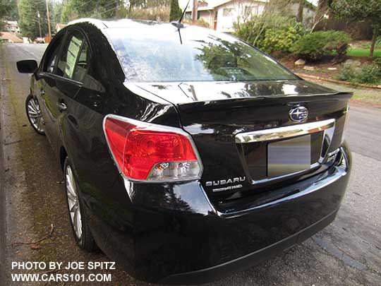 rear view 2015 Subaru Impreza Limited 4 door sedan,  crystal black silica color shown
