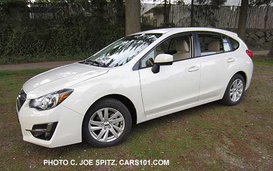 2015 Impreza 5 door hatchback. Crystal white Premium model shown