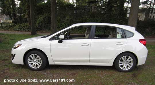 2015 Impreza 5 door hatchback. Crystal white Premium model shown