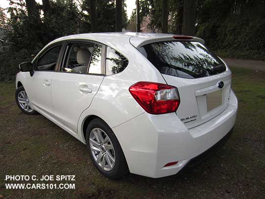 2015 Impreza 5 door hatchback. Crystal white Premium model shown