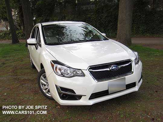 2015 Impreza 5 door hatchback. Crystal white Premium model shown