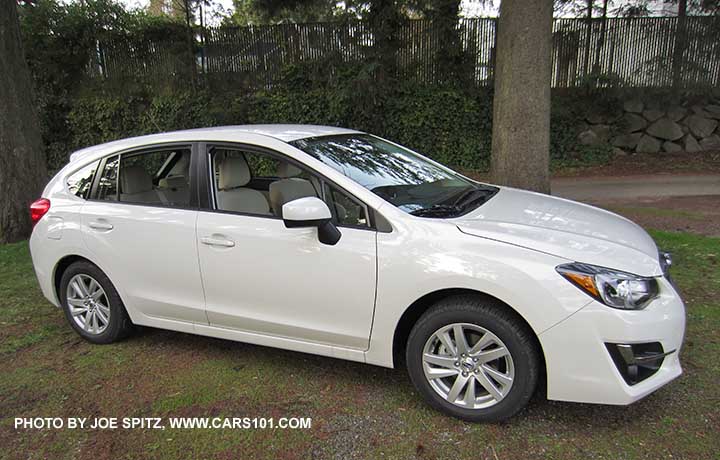 2015 Impreza 5 door hatchback. Crystal white Premium model shown