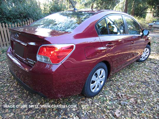 side view 2015 Subaru 2.0i Impreza 4 door sedan, venetian red