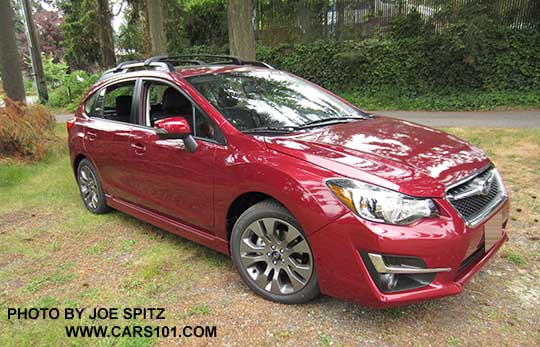 2015 Impreza Sport 5 door, venetian red color.  All Sports have roof rack rails, gray alloys, turn signal mirrors...