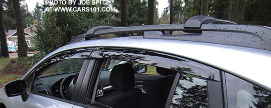close-up of the 2015 impreza 5 door with optional side window deflectors, rain drip moldings