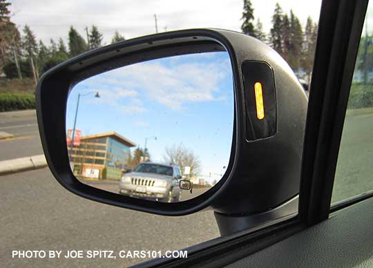 2017 Subaru Impreza blind spot detection symbol in the outside mirror housing