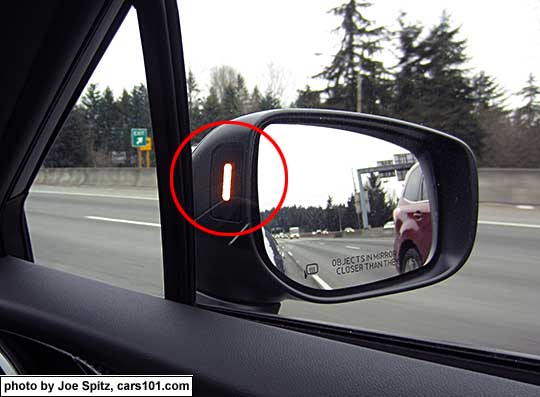 2017 Subaru Impreza blind spot detection symbol in the outside mirror housing