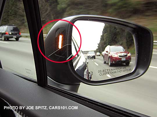 2017 Subaru Impreza blind spot detection symbol in the passenger side outside mirror housing