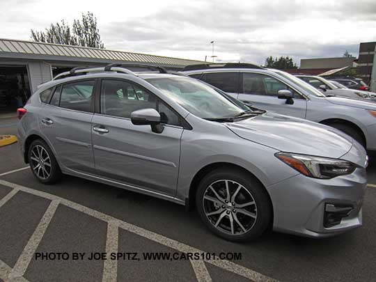 2017 Subaru Impreza 5 door with optional body colored, body side moldings. ice silver shown.