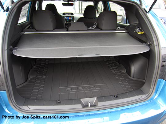 2017 Subaru Impreza 5 door hatchback cargo area with optional cargo tray and luggage area cargo cover