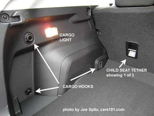 diagrammed 2017 Subaru Impreza 5 door hatchback cargo hooks, child seat tether, cargo light. see arrows.