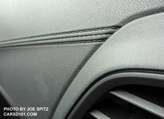 closeup of the 2017 Subaru Impreza 2.0i and Premium molded gray plastic fake-stitch accent line
