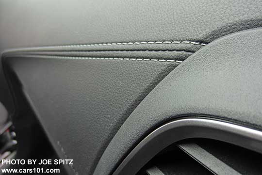 closeup of the 2017 Subaru Impreza Limited dash silver stitched accent line, and matte silver vent trim