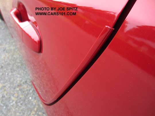 optional 2017 Subaru Impreza rear door edge guard, lithium red car shown