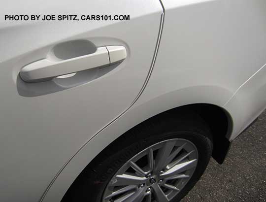 2017 Subaru Impreza optional door edge guards, body colored, set of four. Showing rear door, crystal white 4 door sedan.