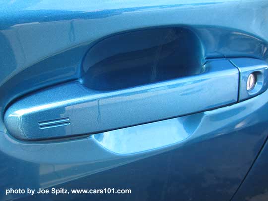 2017 Subaru Impreza Sport driver's door with keyless access and door lock cylinder. Island blue car
