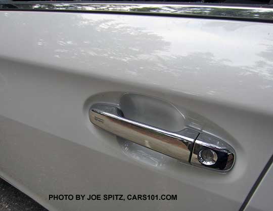 2017 Subaru Impreza Limited bright silver door handle with keyless access rub-to-lock hotspot and look lock cylinder. Crystal white car shown.