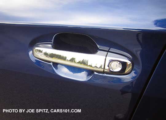 2017 Subaru Impreza Limited bright silver door handle with keyless access rub-to-lock hotspot and door lock cylinder. Lapis blue car shown.