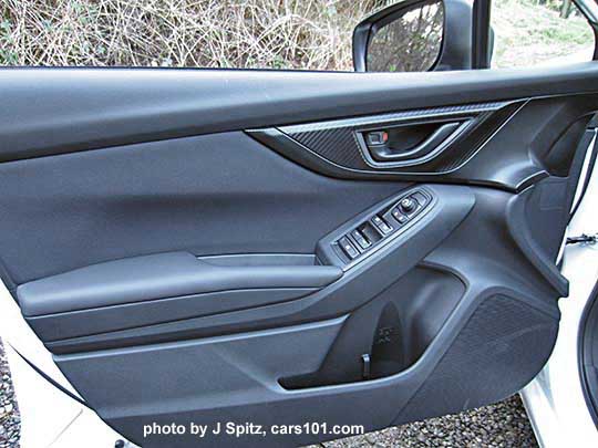 2017 Subaru Impreza 2.0i and Premium driver's door panel, with black inner door handle