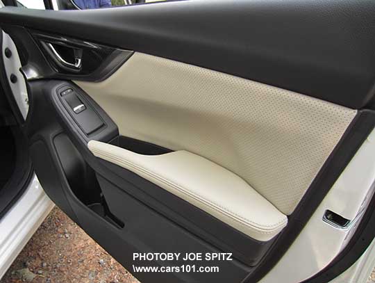 2017 Subaru Impreza Limited front passenger door panel, bright tipped window button, silver handle, perforated ivory leather