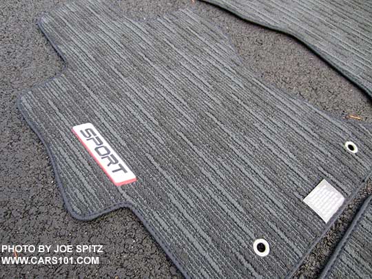 2017 Impreza Sport standard carpeted floor mats with Sport logo. Driver's mat shown