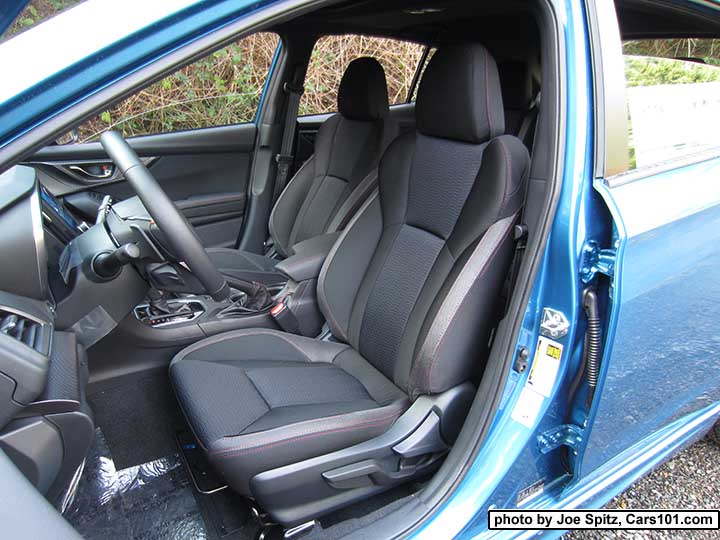 2017 Subaru Impreza Sport black cloth front seats. Island blue car shown
