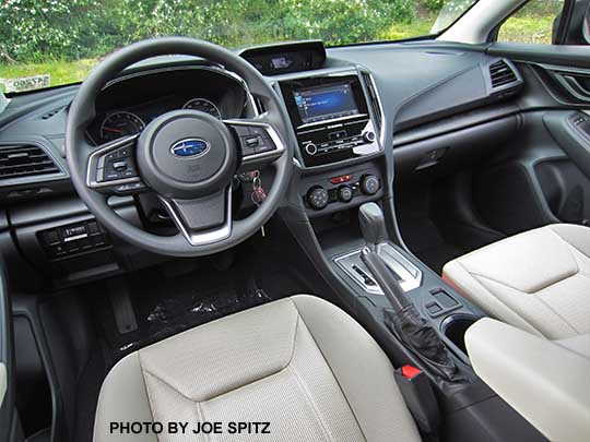 2017 Subaru Impreza 2.0i interior, CVT transmission, silver shift surround. No heated seat buttons. ivory cloth