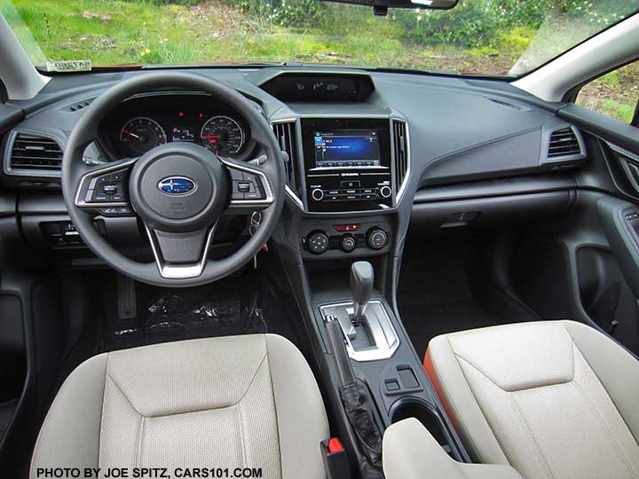2017 Subaru Impreza 2.0i interior, CVT transmission, silver shift surround. 6.5" audio,  No heated seat buttons. ivory cloth