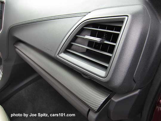 2017 Subaru Impreza 2.0i and Premium gray embossed dash with molded plastic stitching, dark gray patterned trim, gray vent trim
