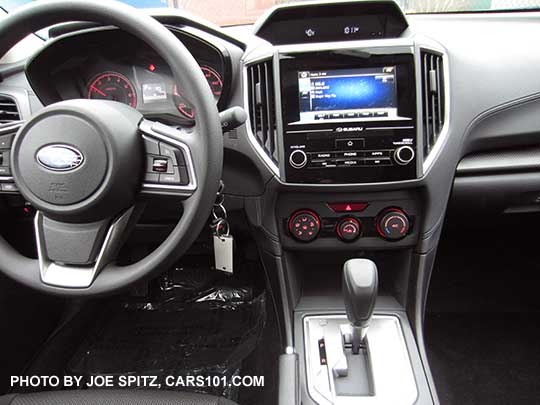 2017 Subaru Impreza 2.0i base and Premium vinyl covered steering wheel, silver shift surround