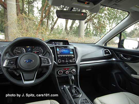 2017 Subaru Impreza Limited interior,  8" audio screen, leather wrapped, silver stitched steering wheel, gloss back shift knob and surround, matte silver passenger side dash trim, silver trimmed automatic climate control knobs, large color upper trip computer. Optional Eyesight cameras.  Ivory leather shown