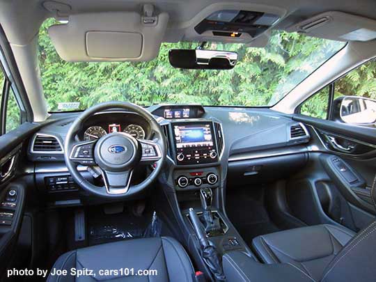 2017 Subaru Impreza Limited interior,  8" audio screen, leather wrapped, silver stitched steering wheel, gloss black shift knob and surround, matte silver passenger side dash trim, automatic climate control knobs, large color upper trip computer.  Ivory leather shown