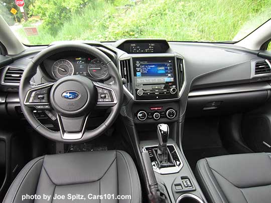 2017 Subaru Impreza Limited interior, perforated black leather with silver stitching, gloss black CVT shift knob and surround, silver trimmed climate control knobs, 8" audio