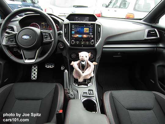 2017 Subaru Impreza Sport interior. This car's owners has a Beanie Baby bat hugging the shifter. I asked why, she said its because she likes it there :).