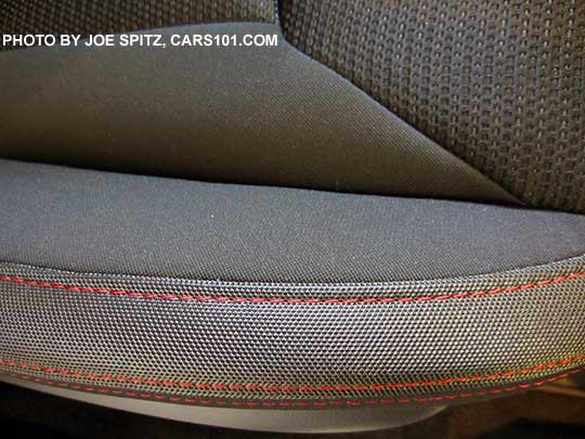 closeup of the 2017 Subaru Impreza Sport black Sport cloth with red stitching. Passenger seat shown.