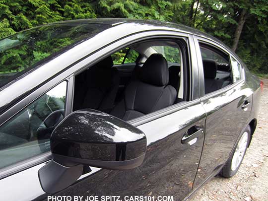 2017 Subaru Impreza 4 door sedan Premium body colored outside mirror, crystal black shown.