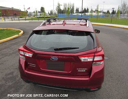 2017 Subaru Impreza 5 door tailgate, venetian red Premium with silver roof rails, optional aero cross bars