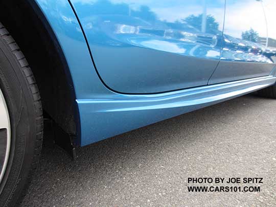 stanbdard 2017 Subaru Impreza Sport lower rocker panel with extra trim piece only available on the Sport 4 and 5 door. Island blue car shown.