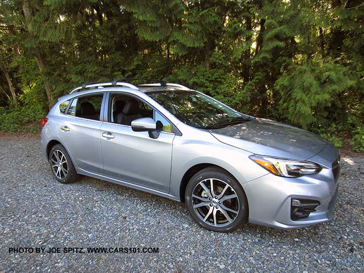 ice silver 2017 Subaru Impreza Limited 5 door hatchback. 17" machined alloys, silver door handles and roof rack rails.