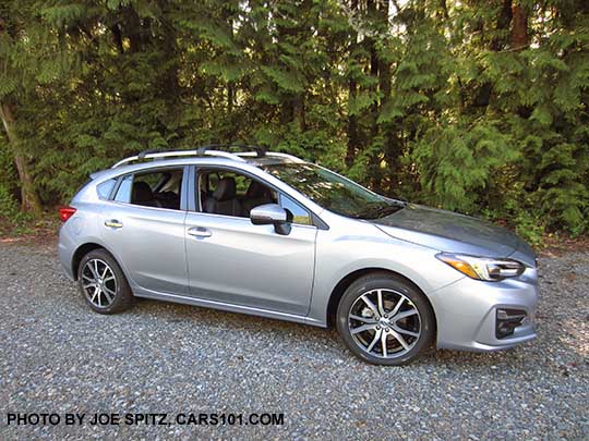 ice silver 2017 Subaru Impreza Limited 5 door hatchback. 17" machined alloys, silver door handles and roof rack rails.