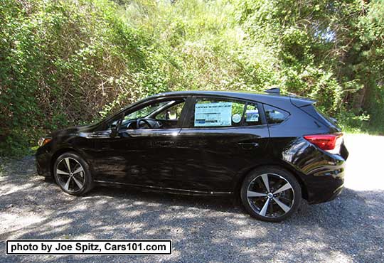 2017 Subaru Impreza Sport 5 door hatchback, 18" machined alloys.  Crystal black shown.