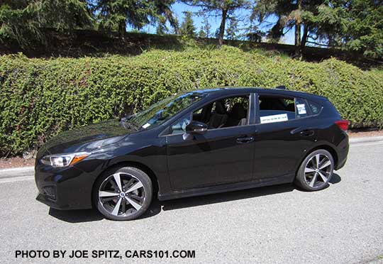 017 Subaru Impreza Sport 5 door hatchback, 18" machined alloys. Crystal black shown.