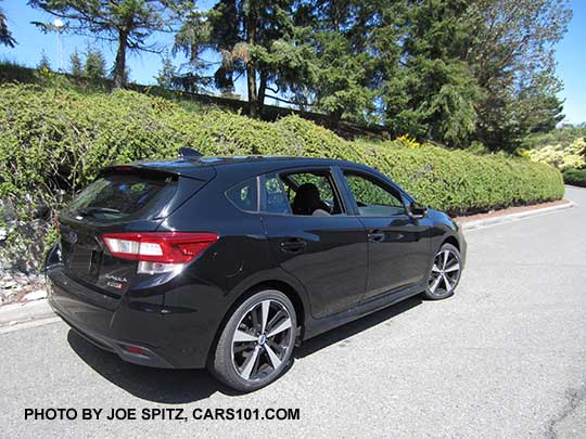 017 Subaru Impreza Sport 5 door hatchback, 18" machined alloys. Crystal black shown.