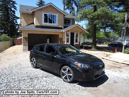 017 Subaru Impreza Sport 5 door hatchback, 18" machined alloys. Crystal black shown.