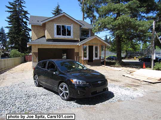 017 Subaru Impreza Sport 5 door hatchback, 18" machined alloys. Crystal black shown.